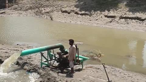 Lifting Water From The River