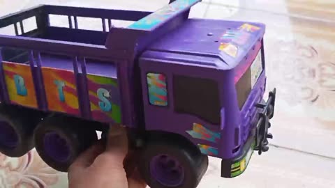 play toy car truck trasporting heavy loads