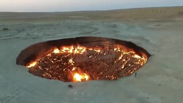 The Turkmen #Gate of #Hell is a 230-foot-long #gas #fire #crater that has been burning since 1971