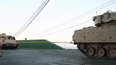 Tanks loading onto mil barge to be taken to Ukraine, and WWIII.