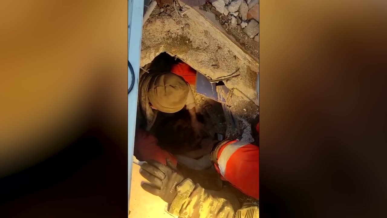 Rescue Crews Struggle To Save Barely Conscious Man After More Than A Day Under The Rubble