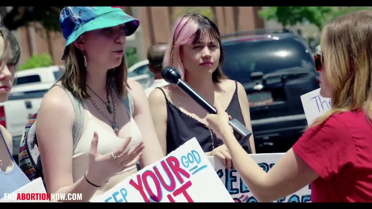 Women Debate At A Rally