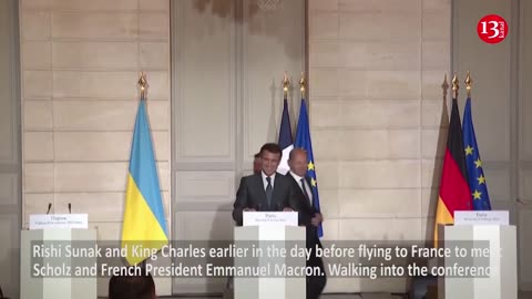 MOMENT: Zelenskiy, Macron, Scholz share laugh over flag mixup in Paris