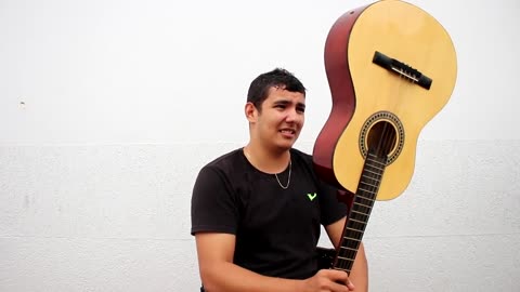 QUEBRANDO VIOLÃO NA CABEÇA
