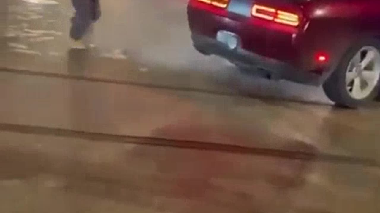Buddy thought it would be a good idea to sit on the window of a drifting car...