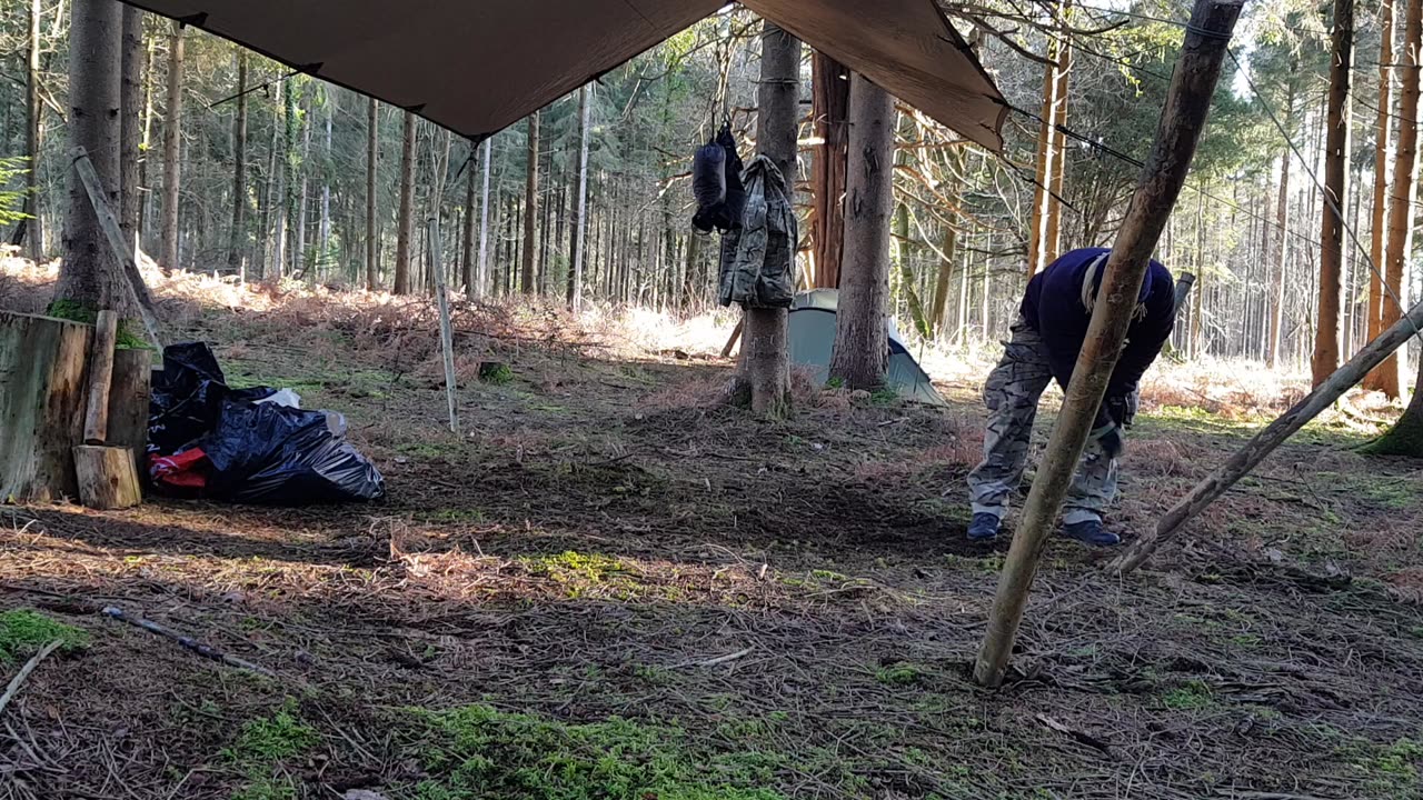 Clearing the ground to make a firepit. 20th Jan 2028