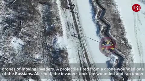 Russians advancing on snowy road encounter a drone - "They run and hide under bridge"