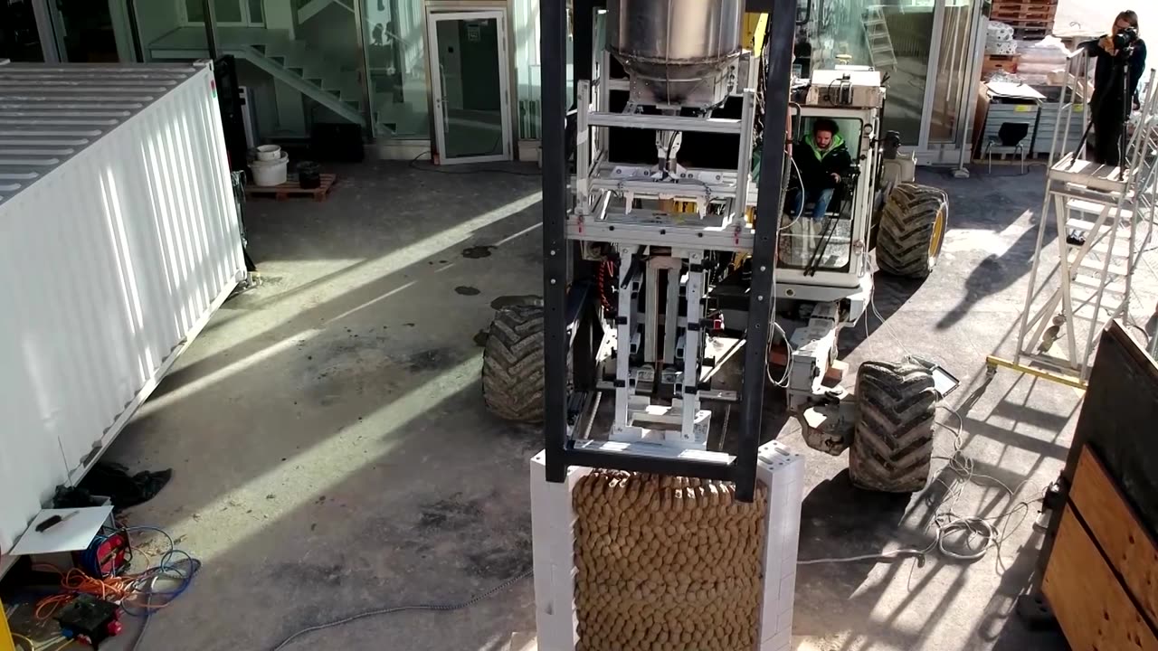 Construction robot shoots clay for cement-free building