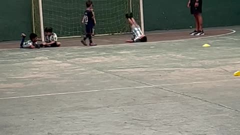 Little Boy Trips Over Ball While Trying to Make Goal