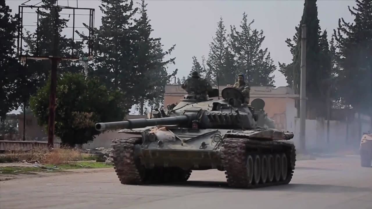 Syrian rebels sweep into Aleppo in major challenge to Assad