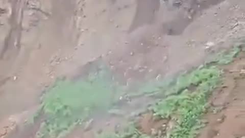 Funny people, awesome landslide almost kills a group on the road