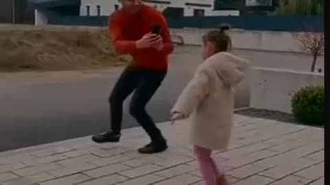 Dad teaching his daughter to dance!