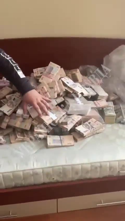 Corruption Probe finds Over a Million Dollars Hidden in tOurhe Couch of a Former deputy Defense Mm