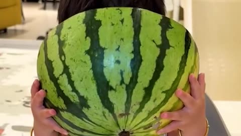 Little boy is obsessed with watermelons.hd