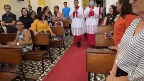 Dog Sleeps in Church During Mass