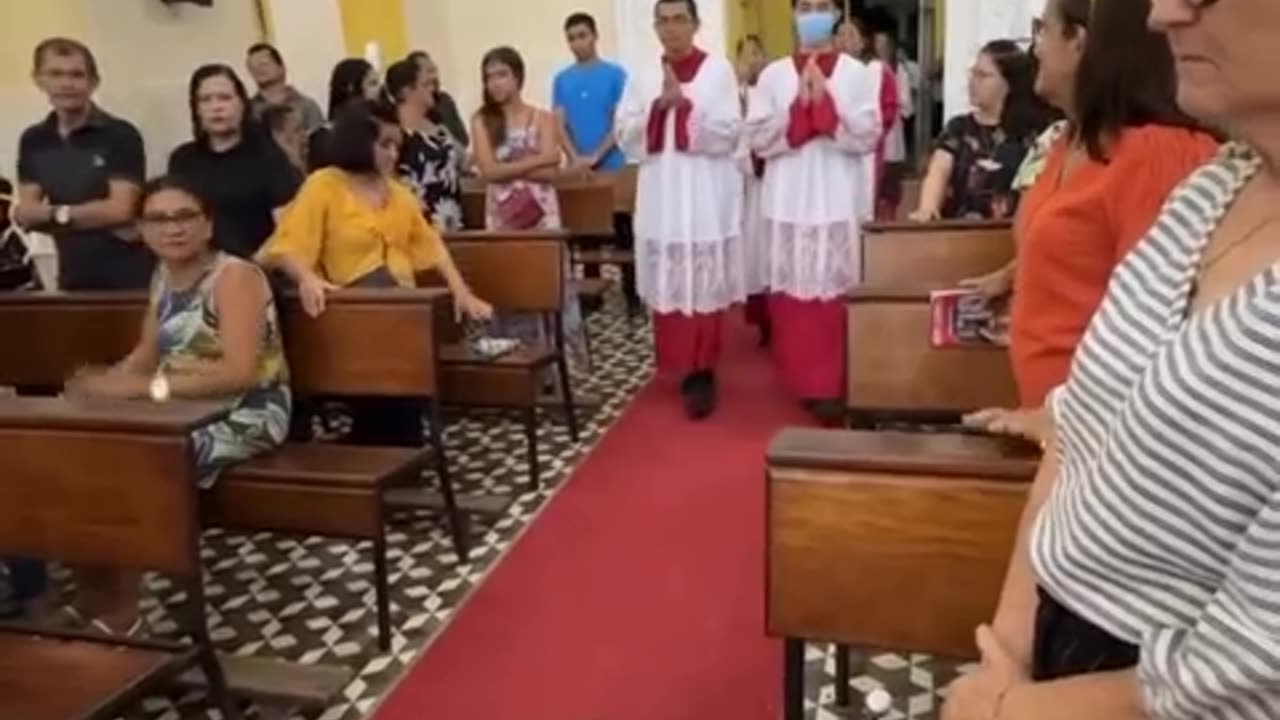 Dog Sleeps in Church During Mass