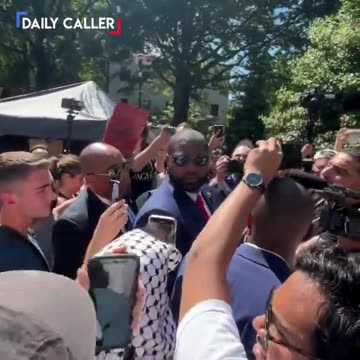 Watch Byron Donalds' response to protester calling him "race traitor," "Uncle Tom"