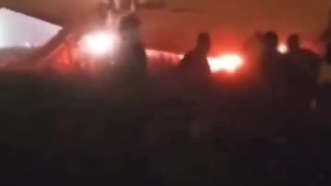 Passengers scramble from burning boeing after a failed takeoff attempt in Senegal