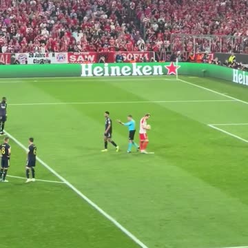 Jude Bellingham trash talking Harry Kane before his penalty…