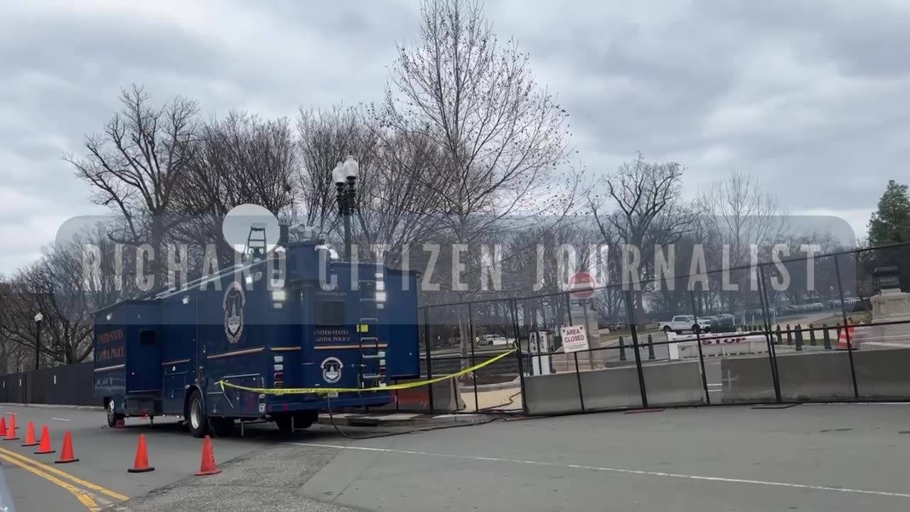 Militant reinforced fencing going up around the Capitol right now,