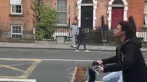 Dublin. A foreigner caught flashing kids is dealt with by an Irish man.