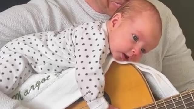 "YOU GOT A FRIEND IN ME" - baby loves Dad signing with guitar