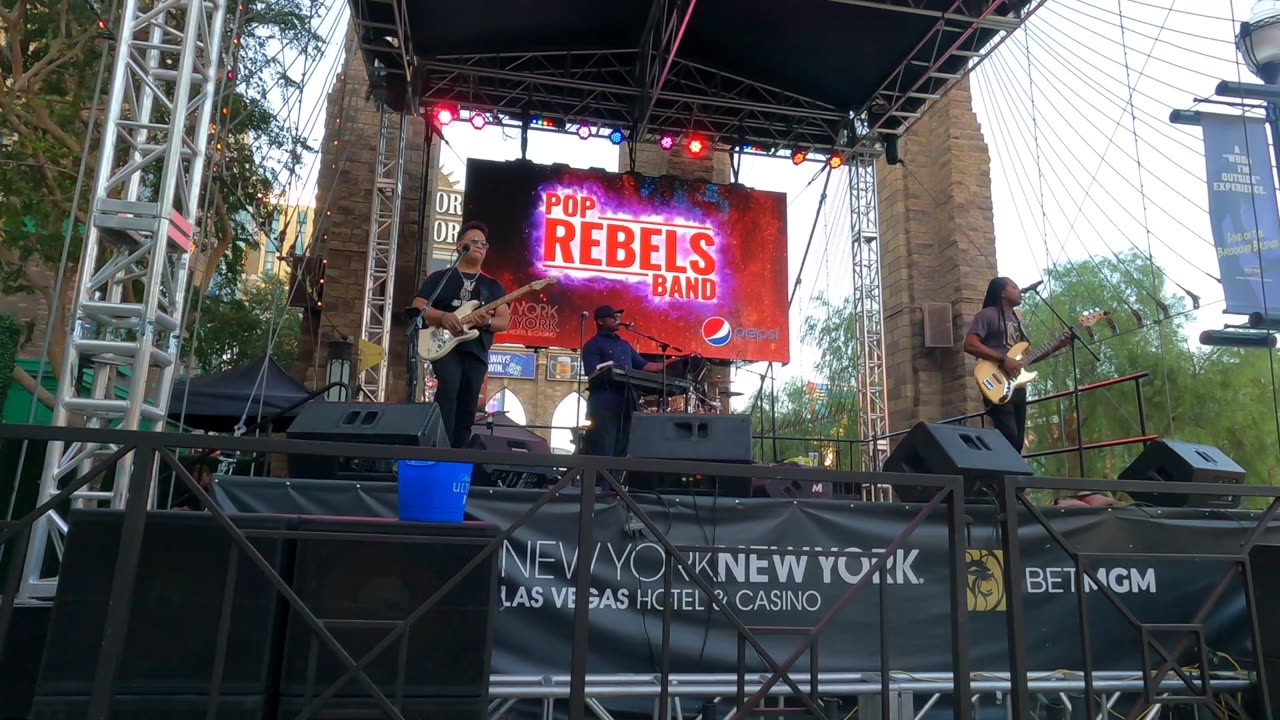 A band playing disco music in front of theNew York, New York Hotel on the Las Vegas strip.