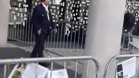 Stickers of the dead caused by the jabs are posted on windows of the BBC.