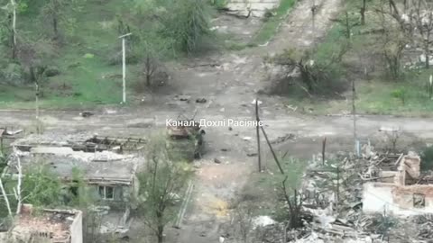 Russian Soldier Runs to Retrieve a Fallen Ukrainian Drone