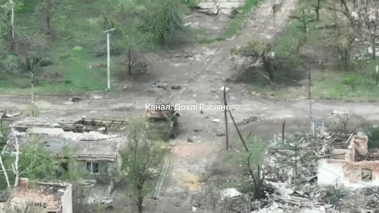 Russian Soldier Runs to Retrieve a Fallen Ukrainian Drone