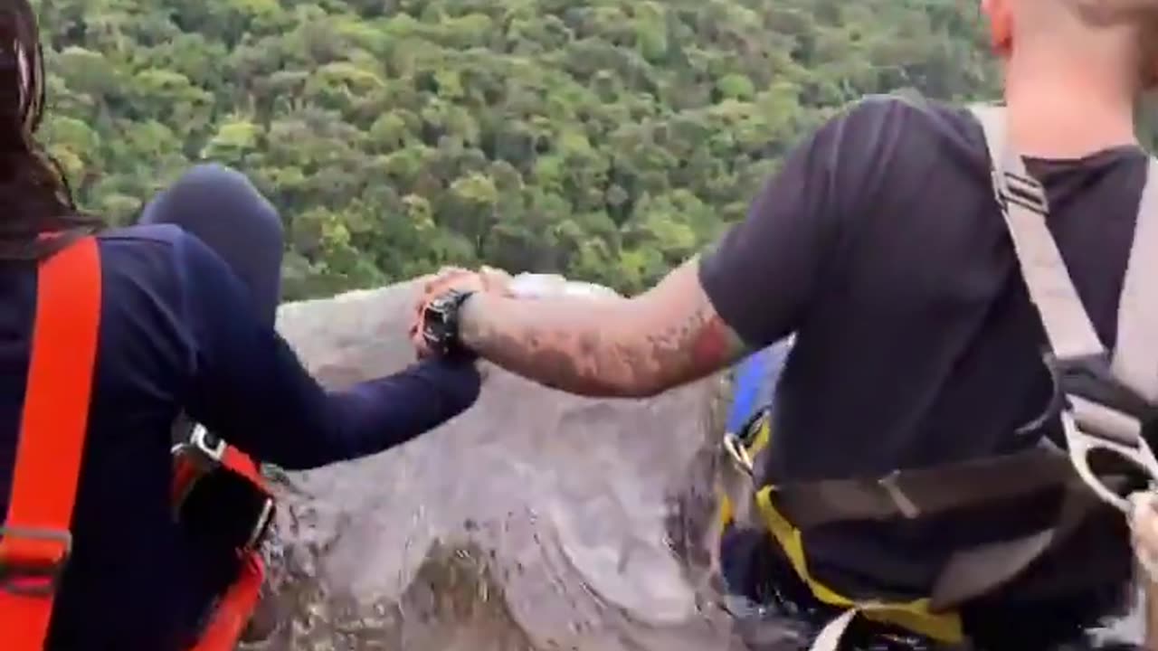 Sitting On Edge Of Waterfall