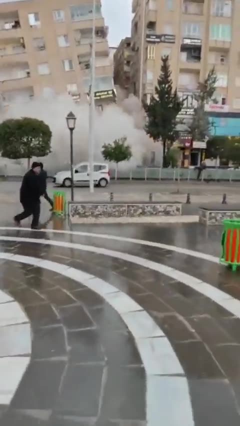 Turkey - Horrific scene as a residential building crumbles down in mere seconds