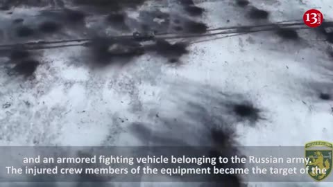 The Russians lying next to the tank were not lucky enough to rest - the drone is at work