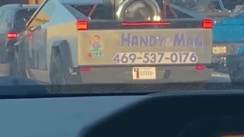 Man Running a Washing Machine in the Back of His Cybertruck in Traffic