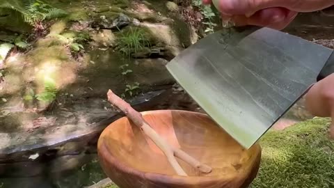 Cooking rice with anchovies on bricks in winter camping