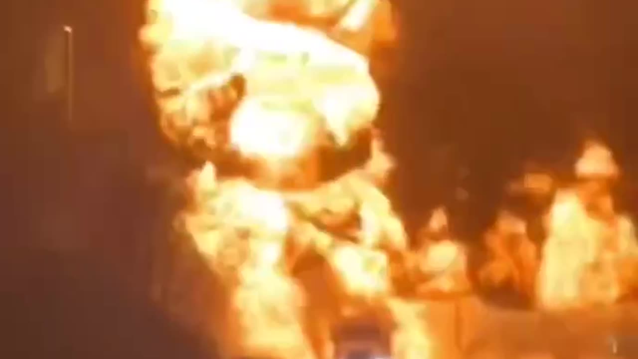 A massive explosion and fire has engulfed a petroleum truck beneath the