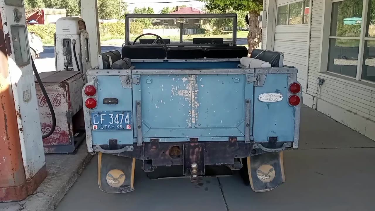 Large Utah License Plate at Old Gas Station & 1965 Land Rover