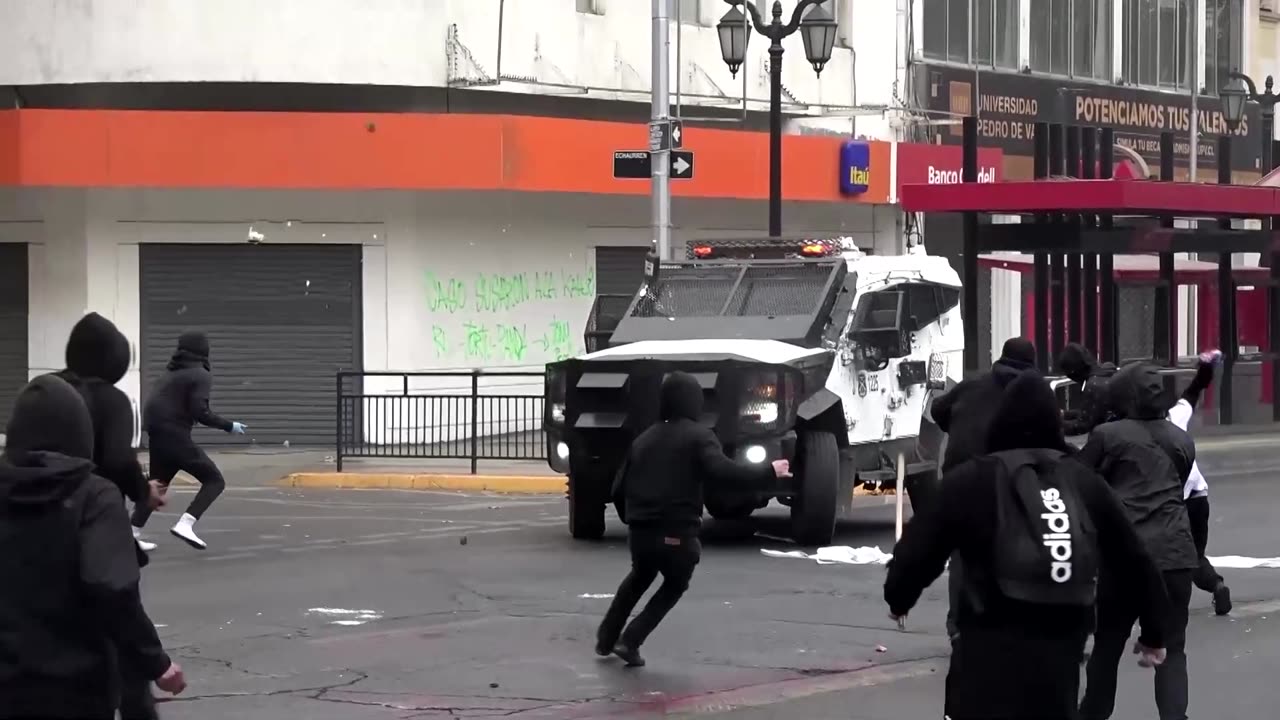 Chilean protesters and police clash at Labor Day rally