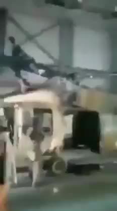 Taliban Fighters Riding on Top of Helicopter Blades