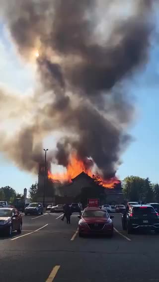 The historical Notre-Dame-des-Sept-Allégresses in Trois-Rivières, Canada, is currently ablaze