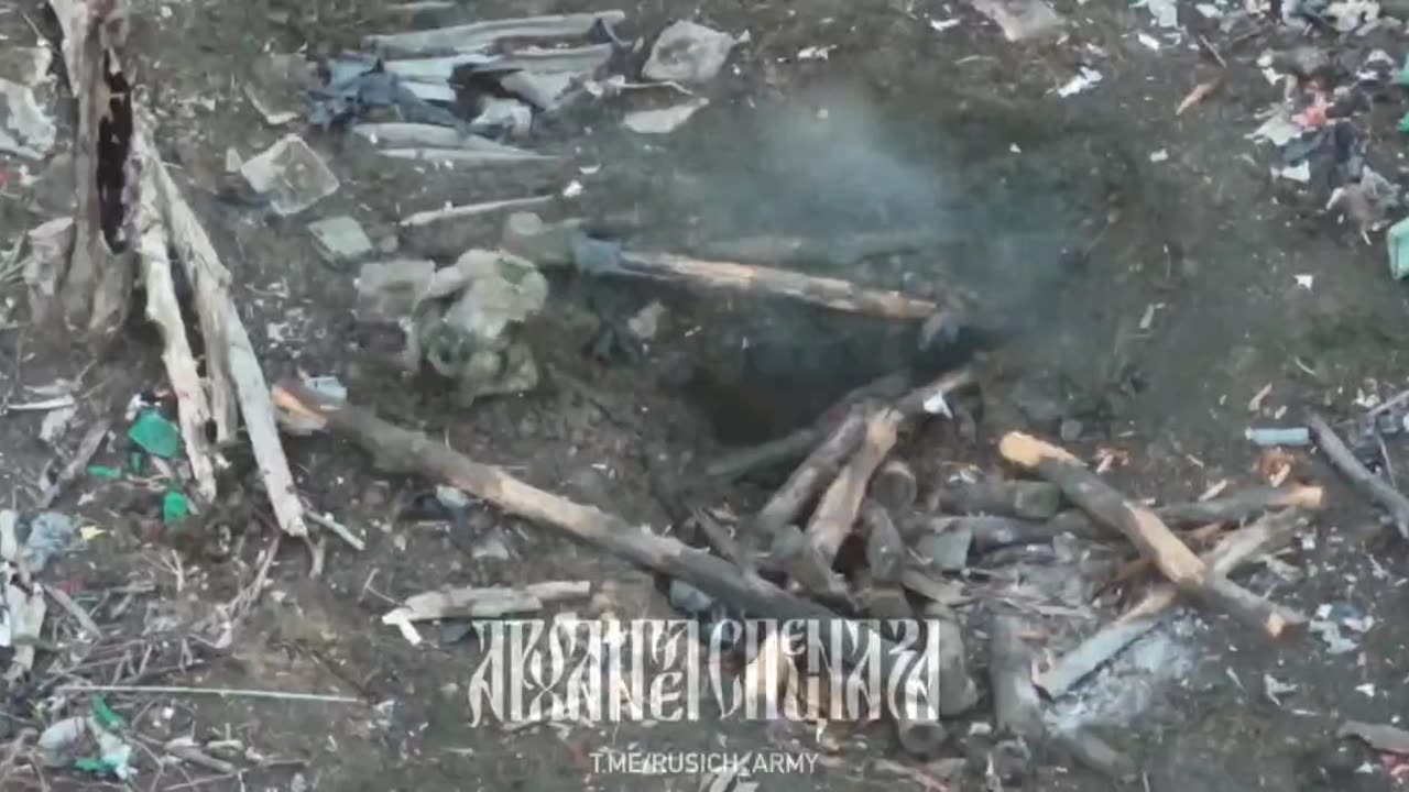 Russian soldier blows up Ukrainian militants hiding in a hole.