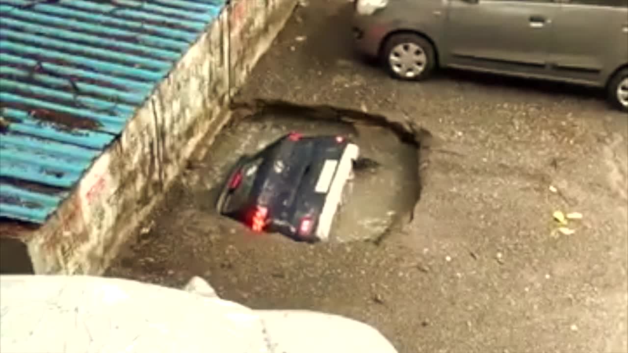 Whole Car Gets "EATEN" By Sinkhole