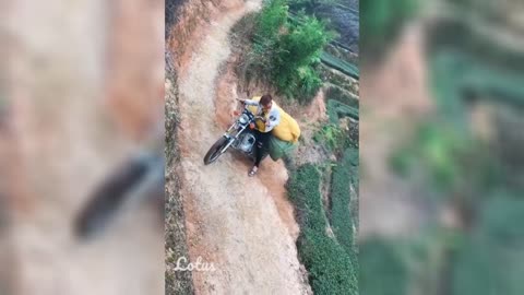 WORLDS DANGEROUS ROAD (WOMAN MOTORCYCLE RIDER)