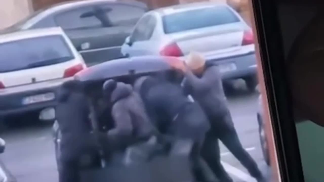 A man kidnapped and forced into the trunk of a car by armed kidnappers, Villeparisis, France.