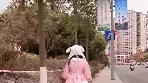Little girl: The daily life of walking the dog