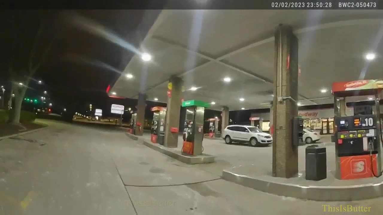 Body cam shows officer's encounter with man with long gun at gas station