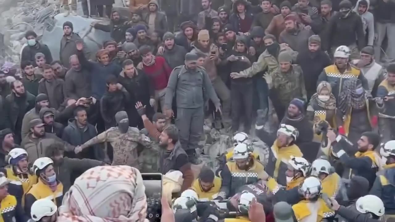 Crowd erupts in cheers as an entire family emerges from the Syria Earthquake rubble