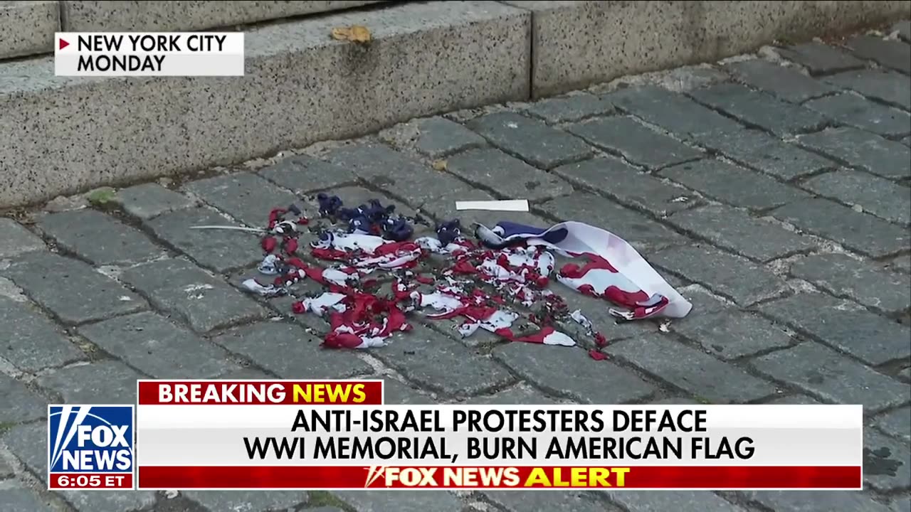 Anti-Israel agitators burn US flag, deface WWI monument