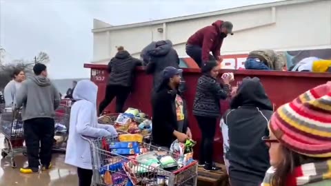 Hungry people dumpster diving for food in Austin, Texas.