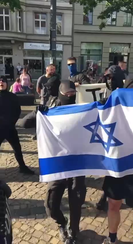 “Antifa waving the flag of their masters“